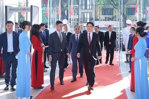 Chủ tịch nước dự Lễ kỷ niệm 50 năm Quốc khánh Lào và 105 năm Ngày sinh Chủ tịch Kaysone Phomvihane